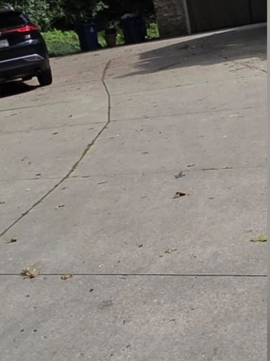 The same driveway before pressure washing